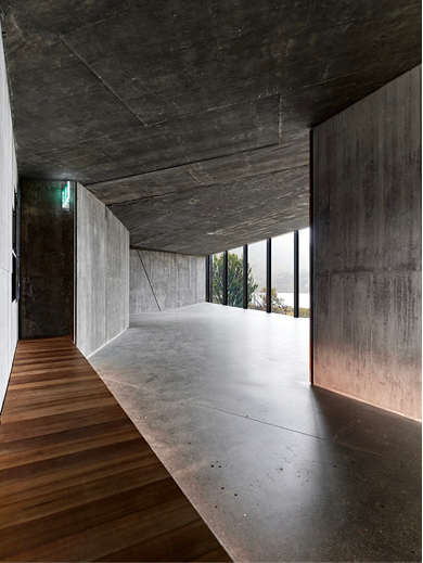 Microcement interior with seamless gray walls and floor